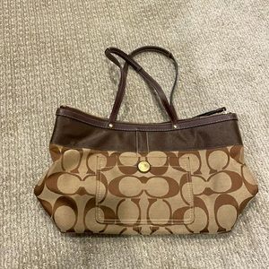 Brown coach purse.
